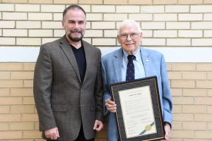 Hazel and Booth with proclamation