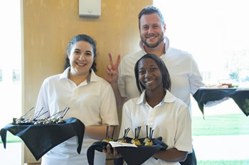 Student Serving Guests